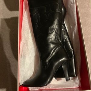 Tall black leather Coach boots